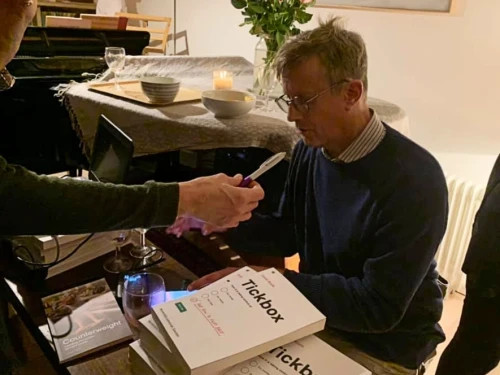David signing books