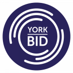 YORKBID_logo_White on blue circle