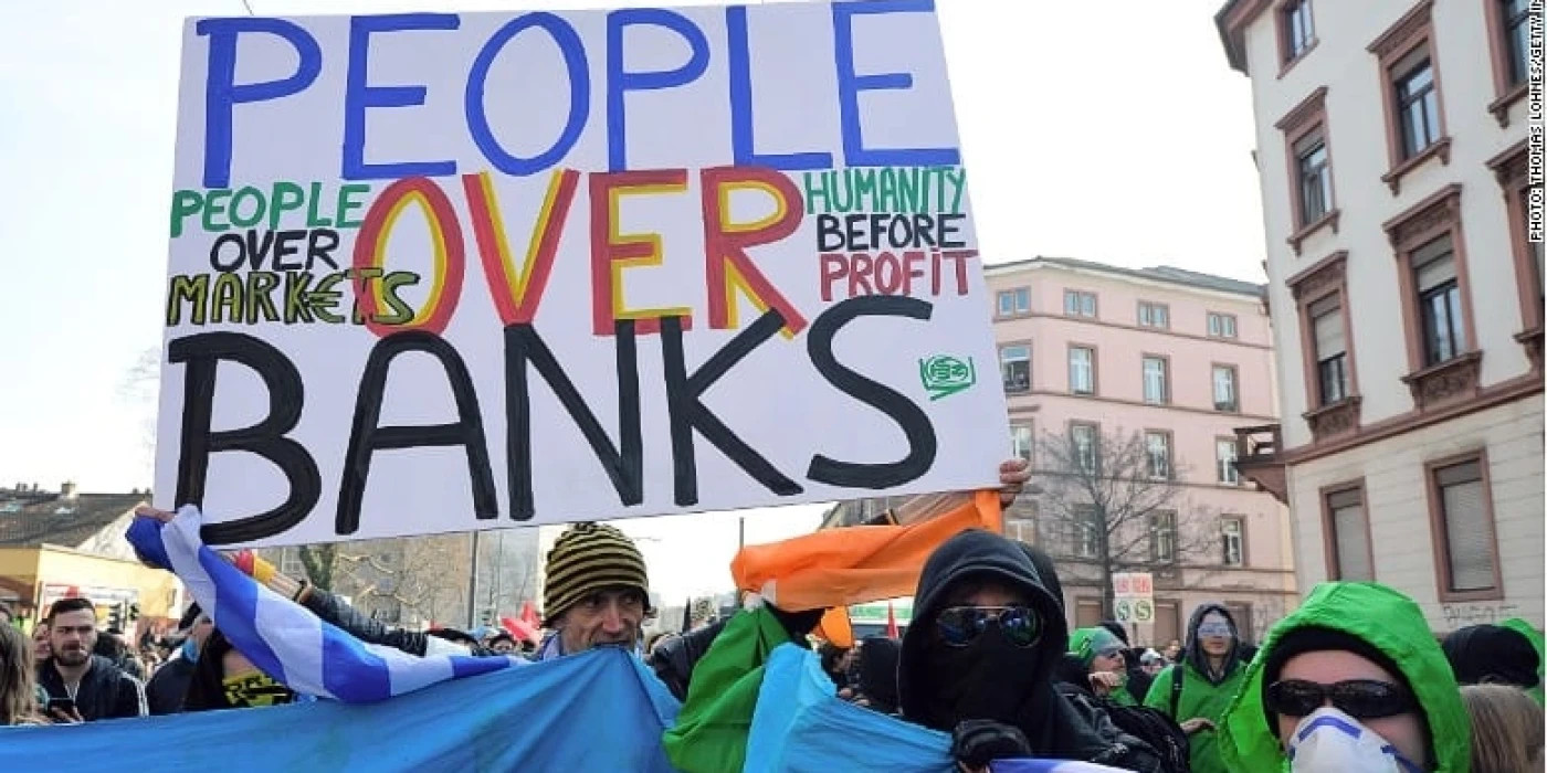 150318111903-ecb-protest-bank-780x439-1